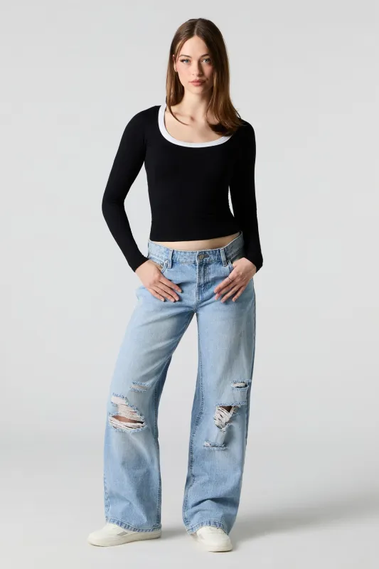 Jean à jambe large et taille basse d'aspect usé délavé moyen sold by Urban Planet