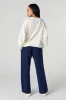 Pantalon d'entraînement à jambe évasée en molleton à imprimé Stitch sold by Urban Planet