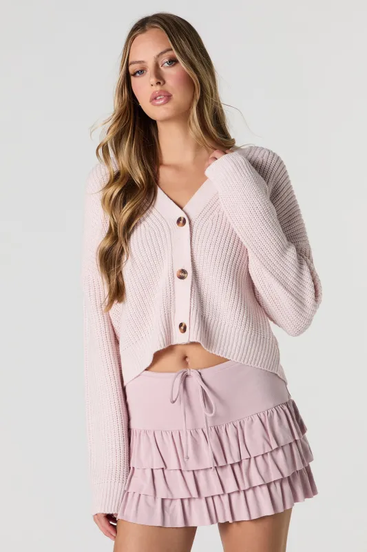 Cardigan boutonné en tricot sold by Urban Planet