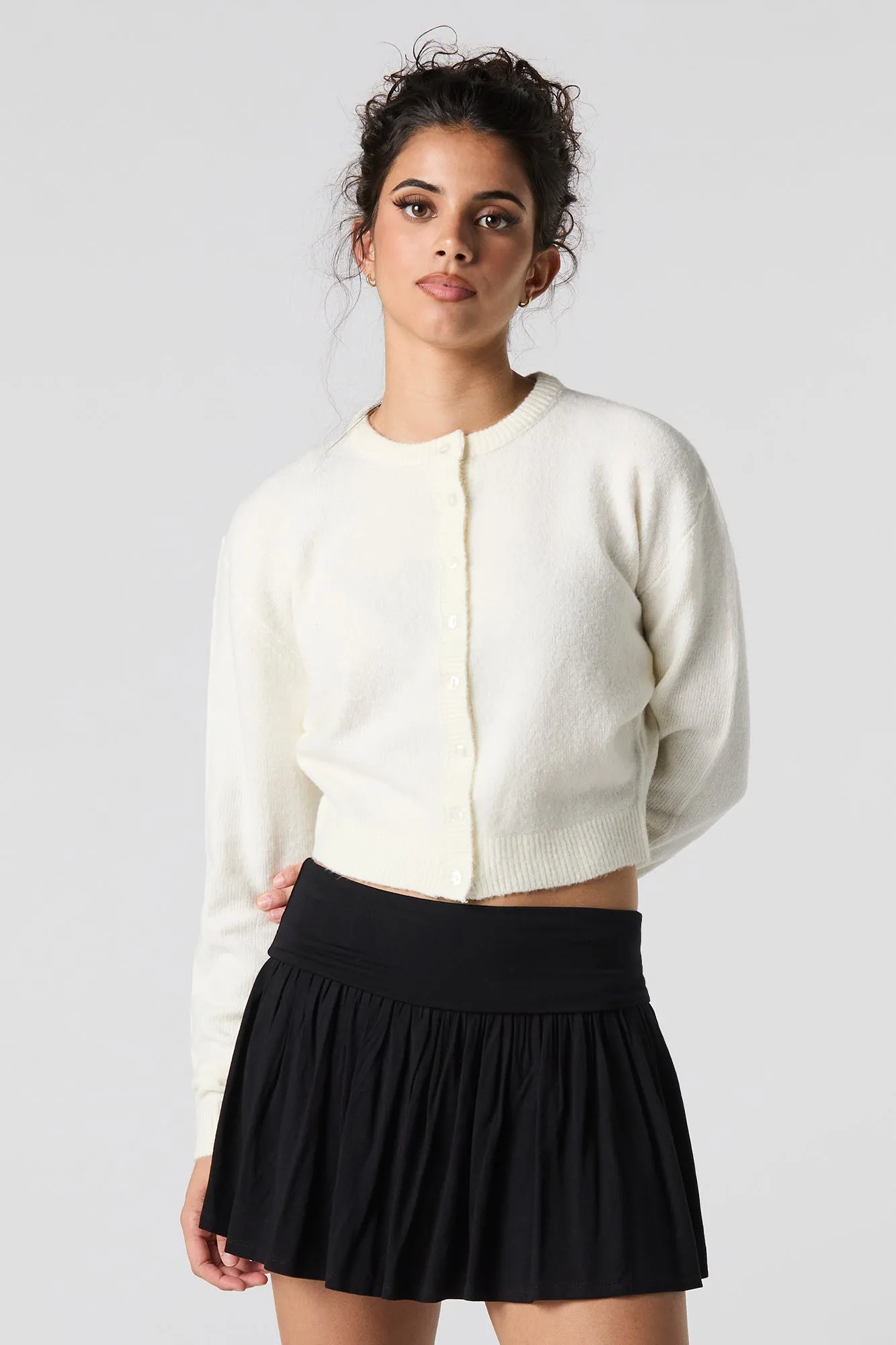 Cardigan boutonné en tricot mousseux sold by Urban Planet