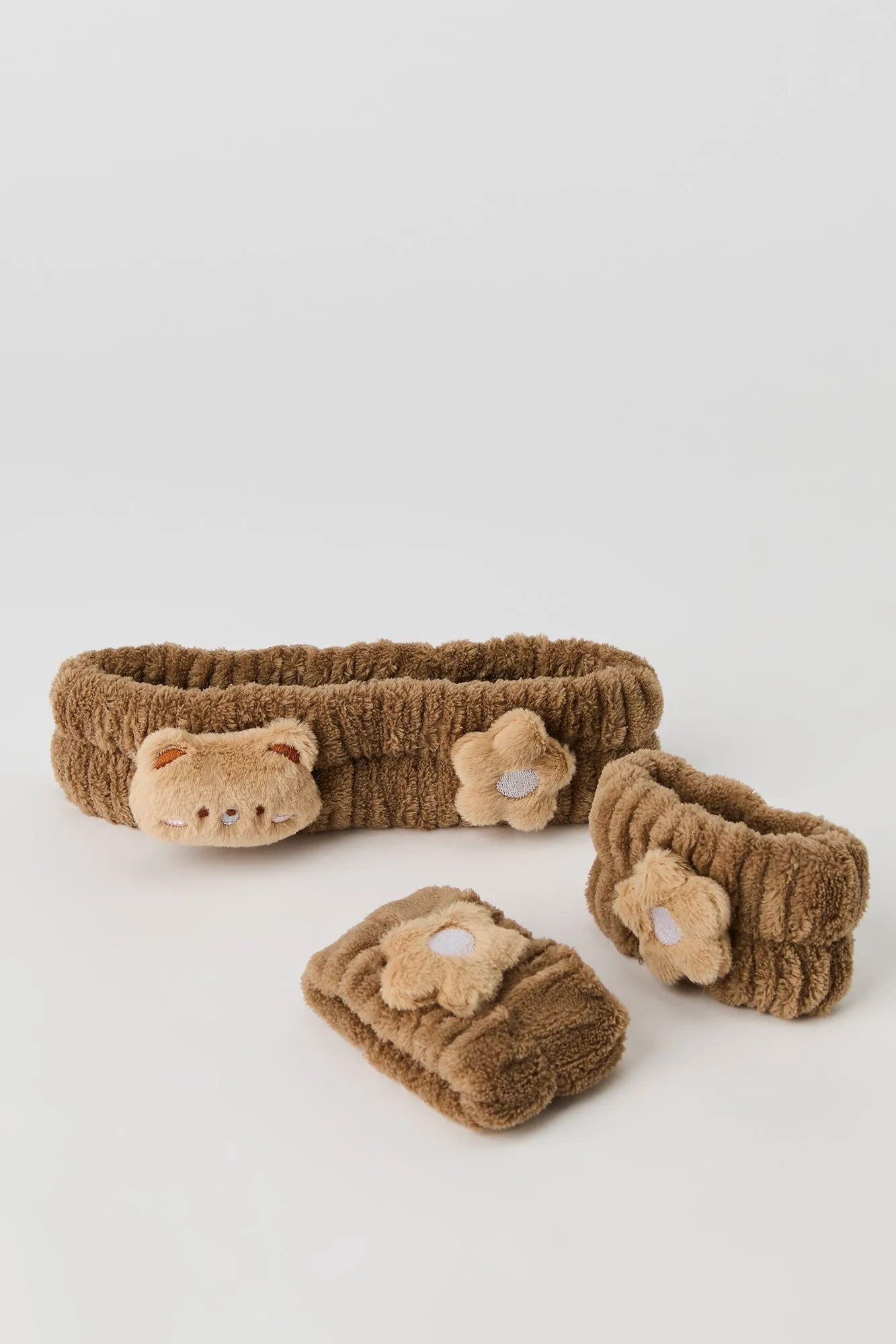 Bandeau et poignets en peluche avec boucle en forme de personnage sold by Urban Planet product image thumbnail 5