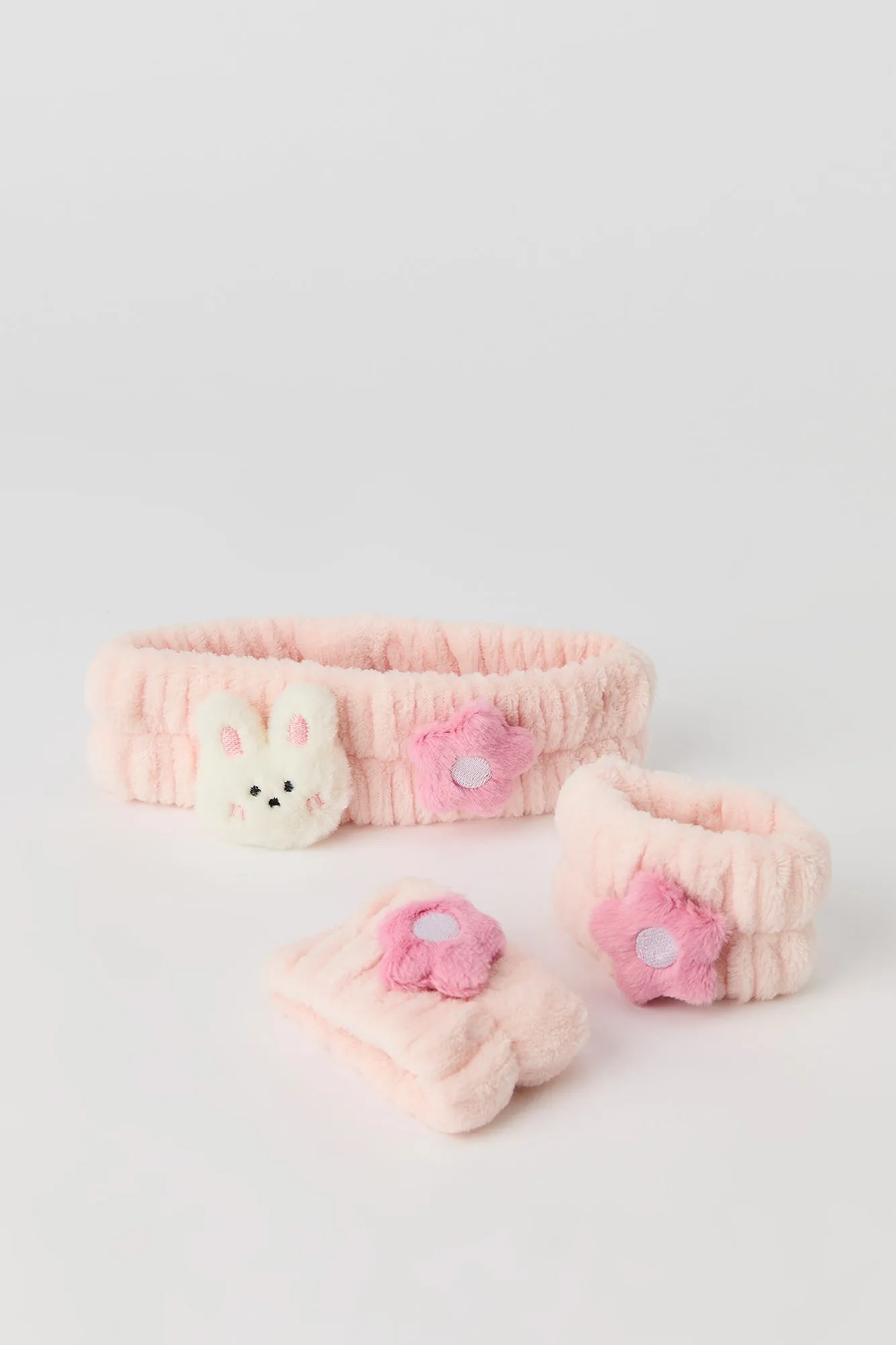 Bandeau et poignets en peluche avec boucle en forme de personnage sold by Urban Planet