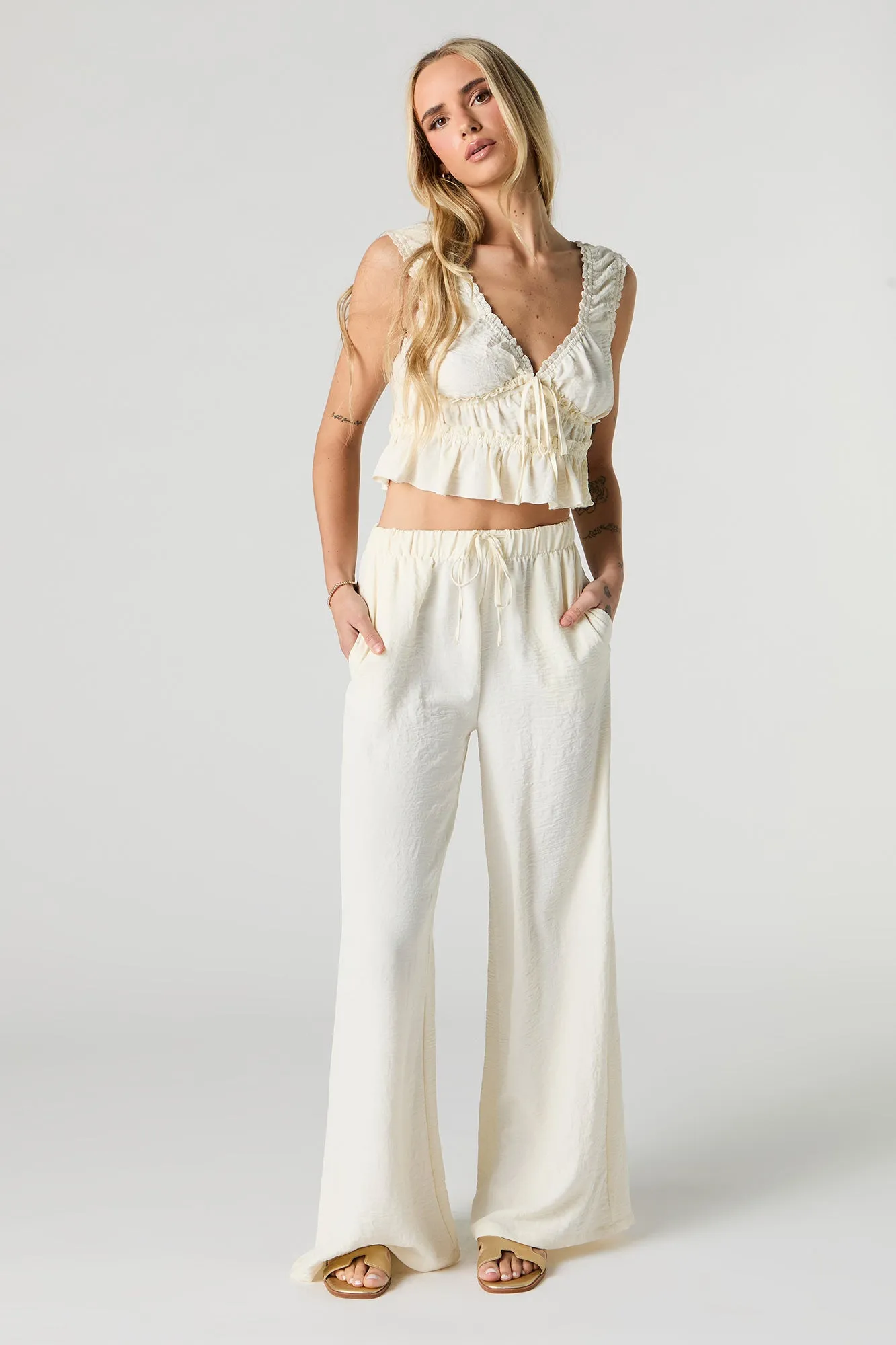 Pantalon fluide à taille coulissante sold by Urban Planet