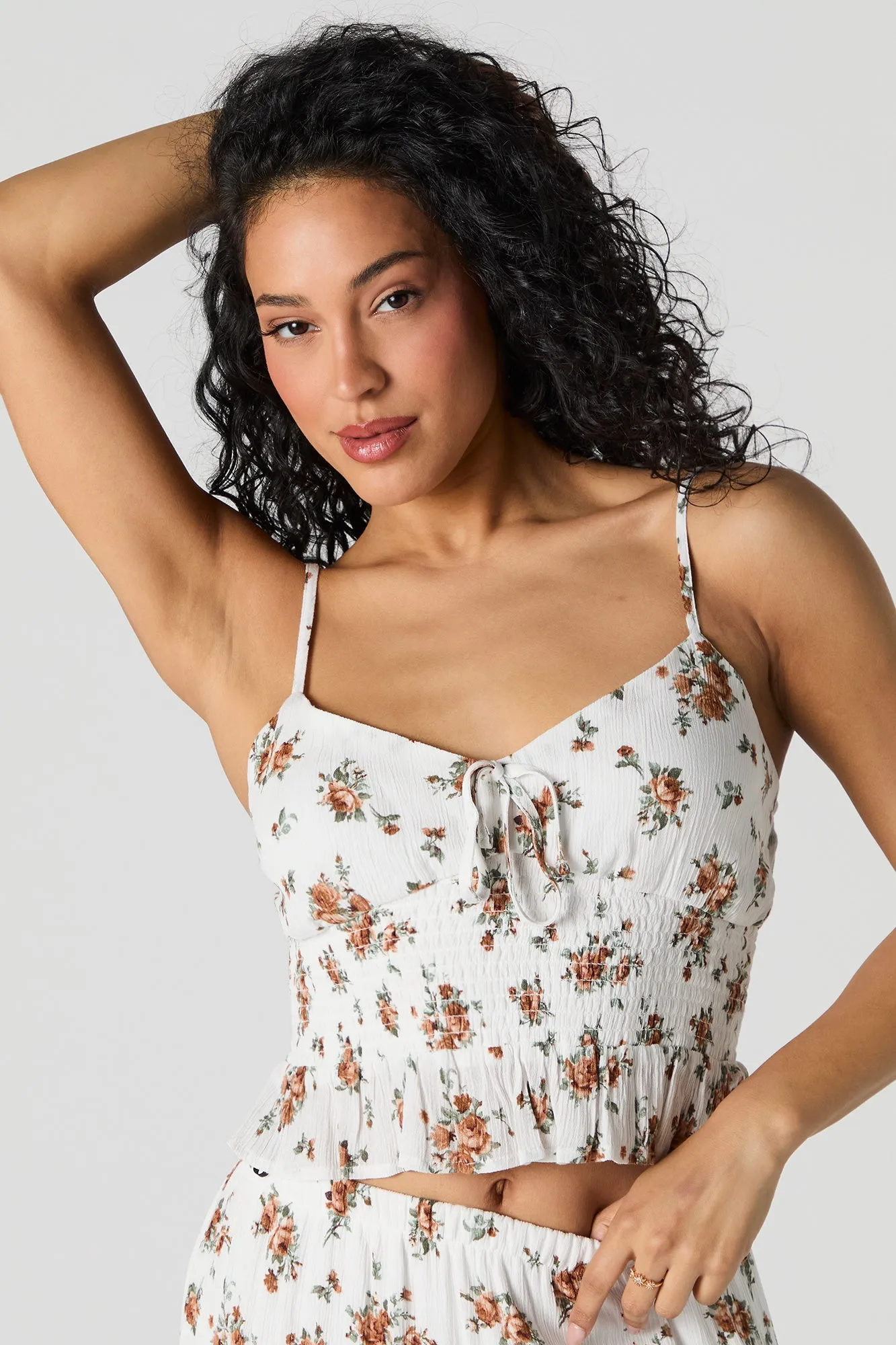 Camisole courte smockée fleurie sold by Urban Planet
