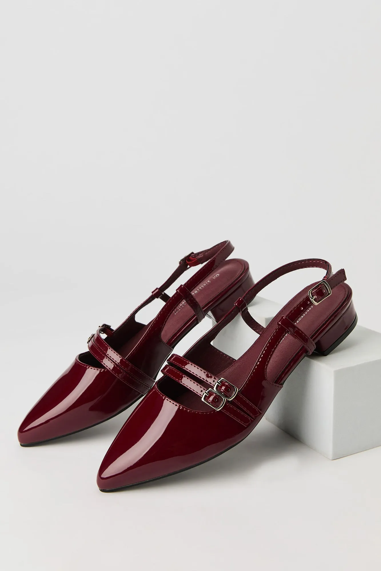 Buckled Slingback Pumps sold by Urban Planet