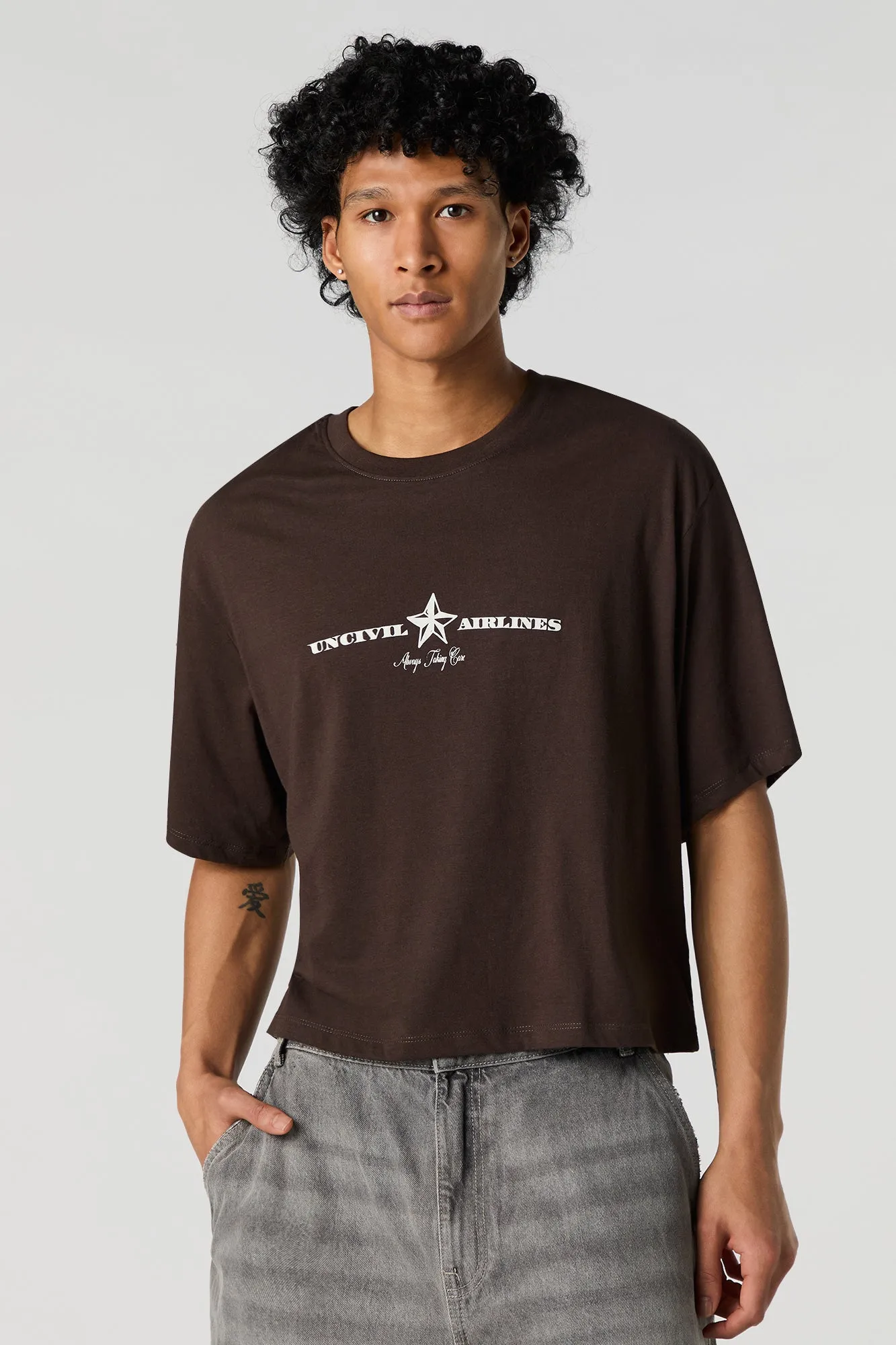 Uncivil Airlines Graphic Boxy T-Shirt sold by Urban Planet