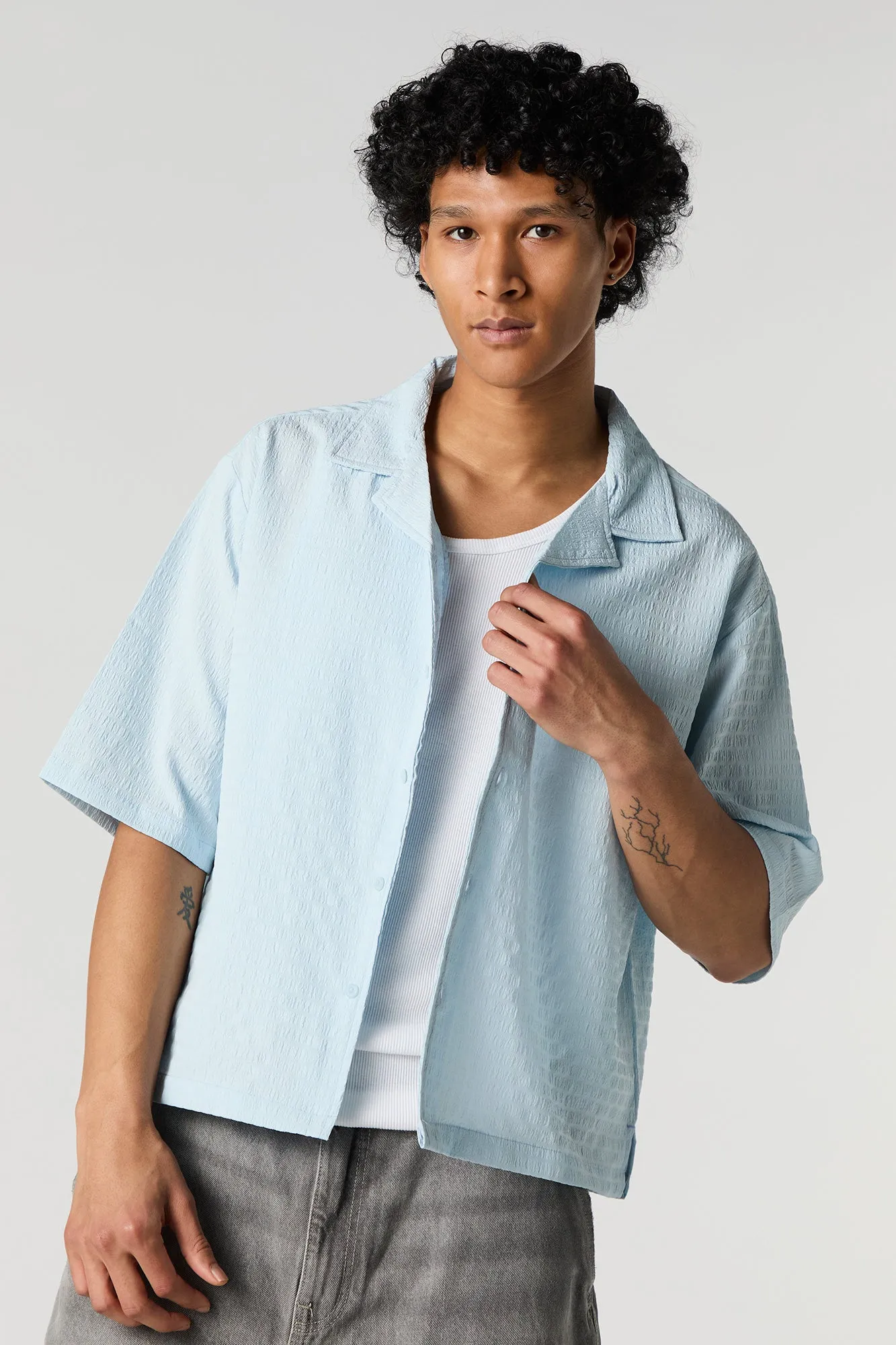 Textured Short Sleeve Button-Up Top sold by Urban Planet
