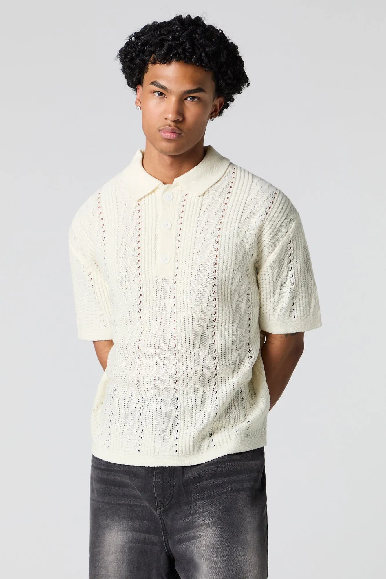 Polo texturé en tricot ouvert sold by Urban Planet