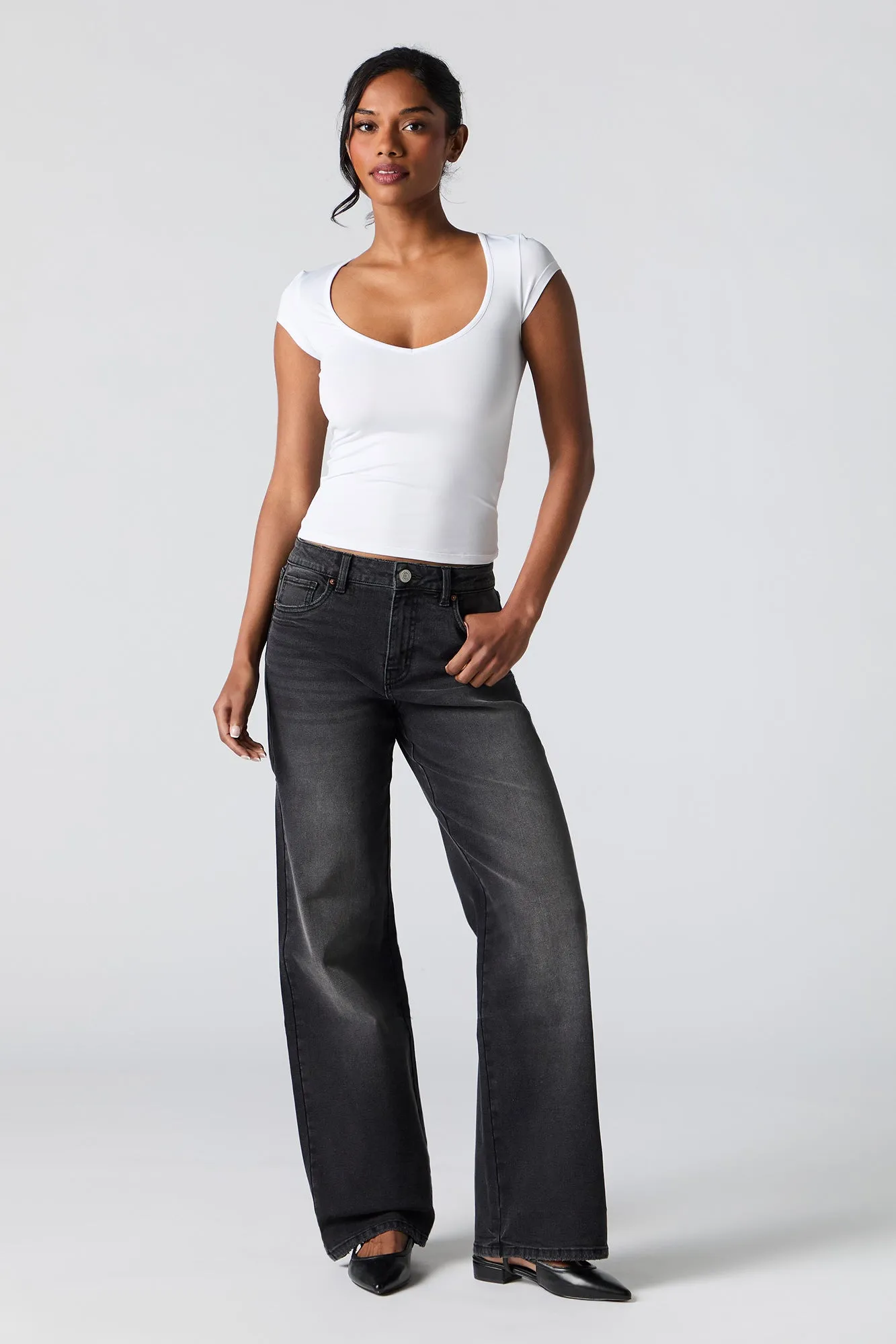 Jean extensible à jambe large délavé noir sold by Urban Planet