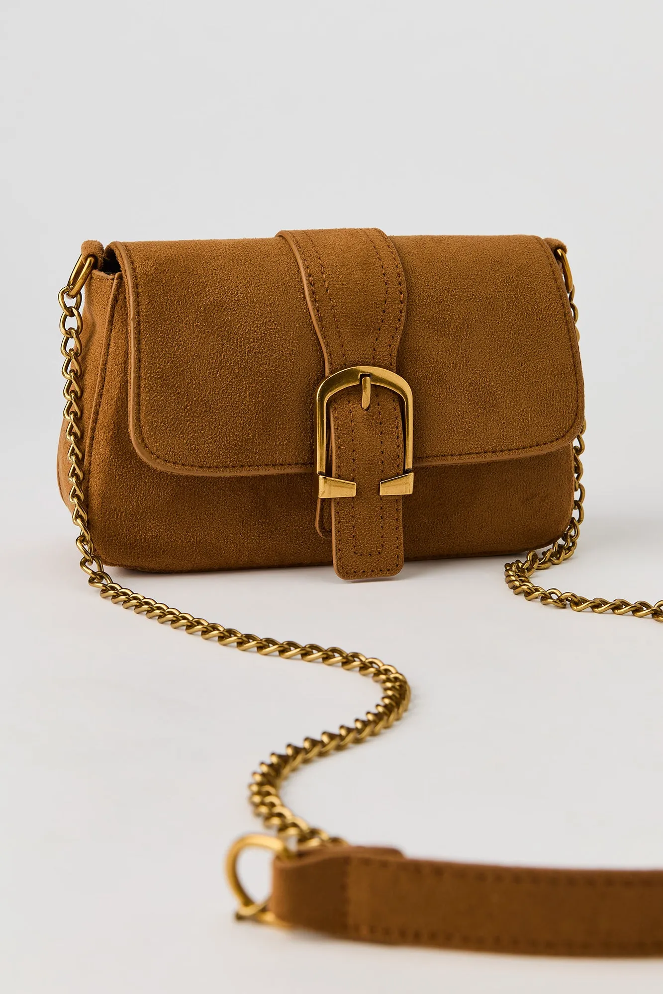 Faux Suede Buckle Crossbody Purse sold by Urban Planet
