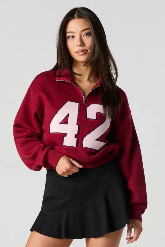 Embroidered Quarter Zip Fleece Sweatshirt sold by Urban Planet