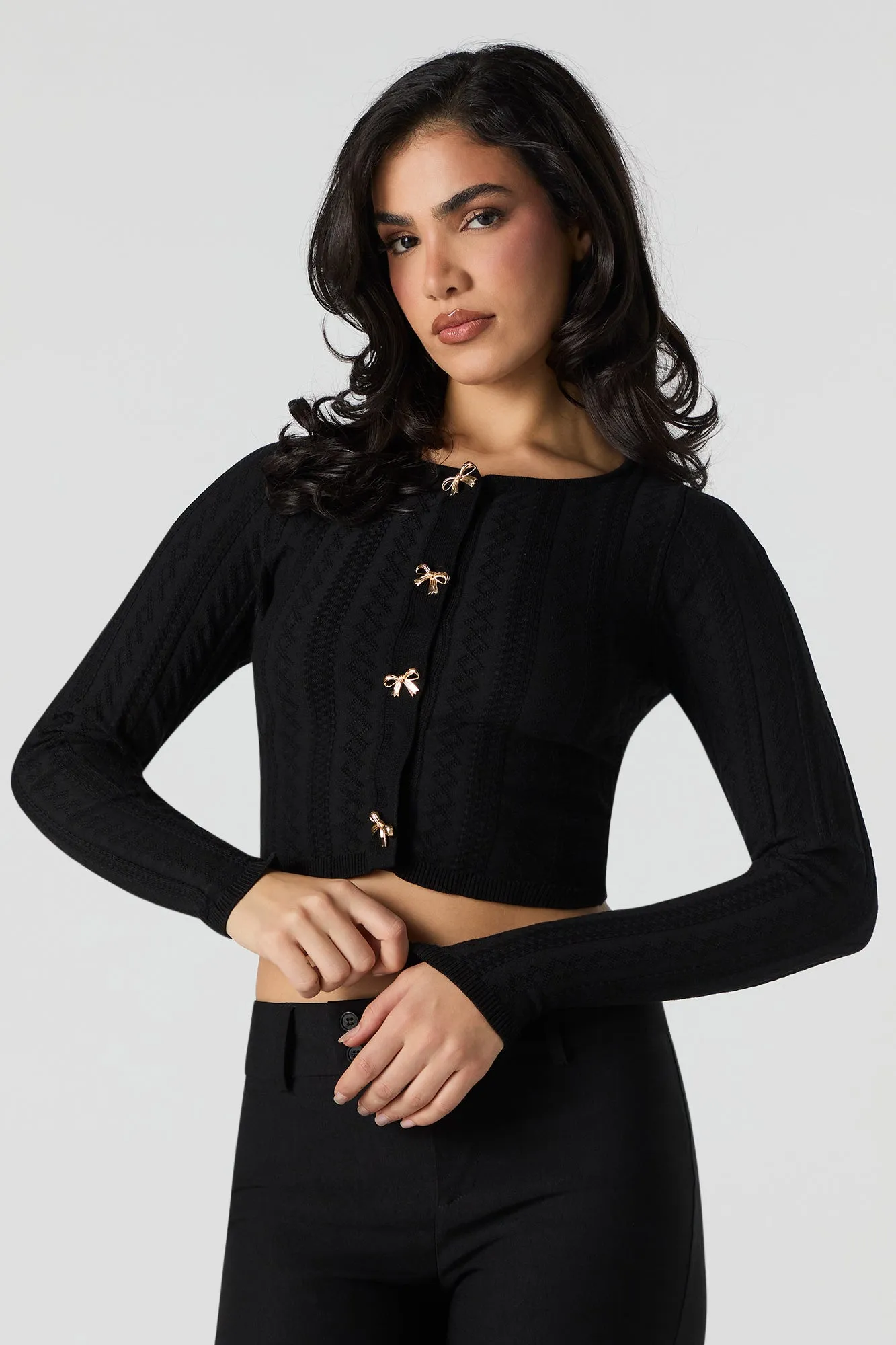 Pointelle Knit Bow Button Sweater sold by Urban Planet