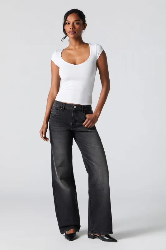 Jean extensible à jambe large noir sold by Urban Planet