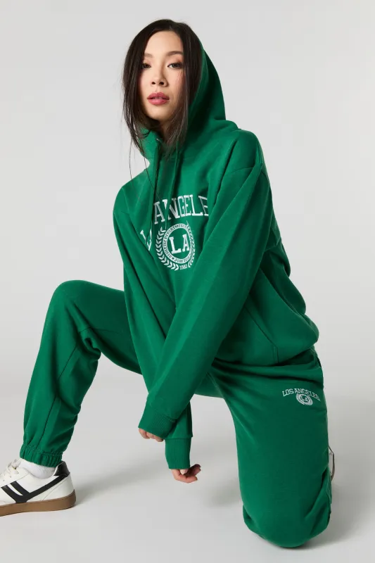 Jogger en molleton à broderie Destination sold by Urban Planet