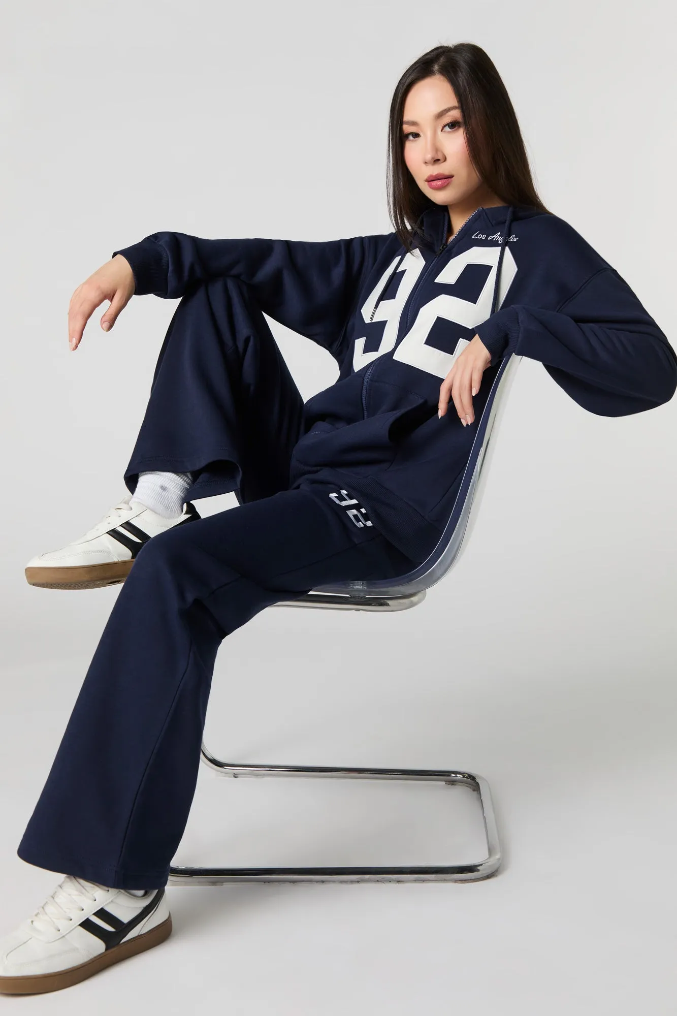 Destination Embroidered Wide Leg Fleece Sweatpant sold by Urban Planet