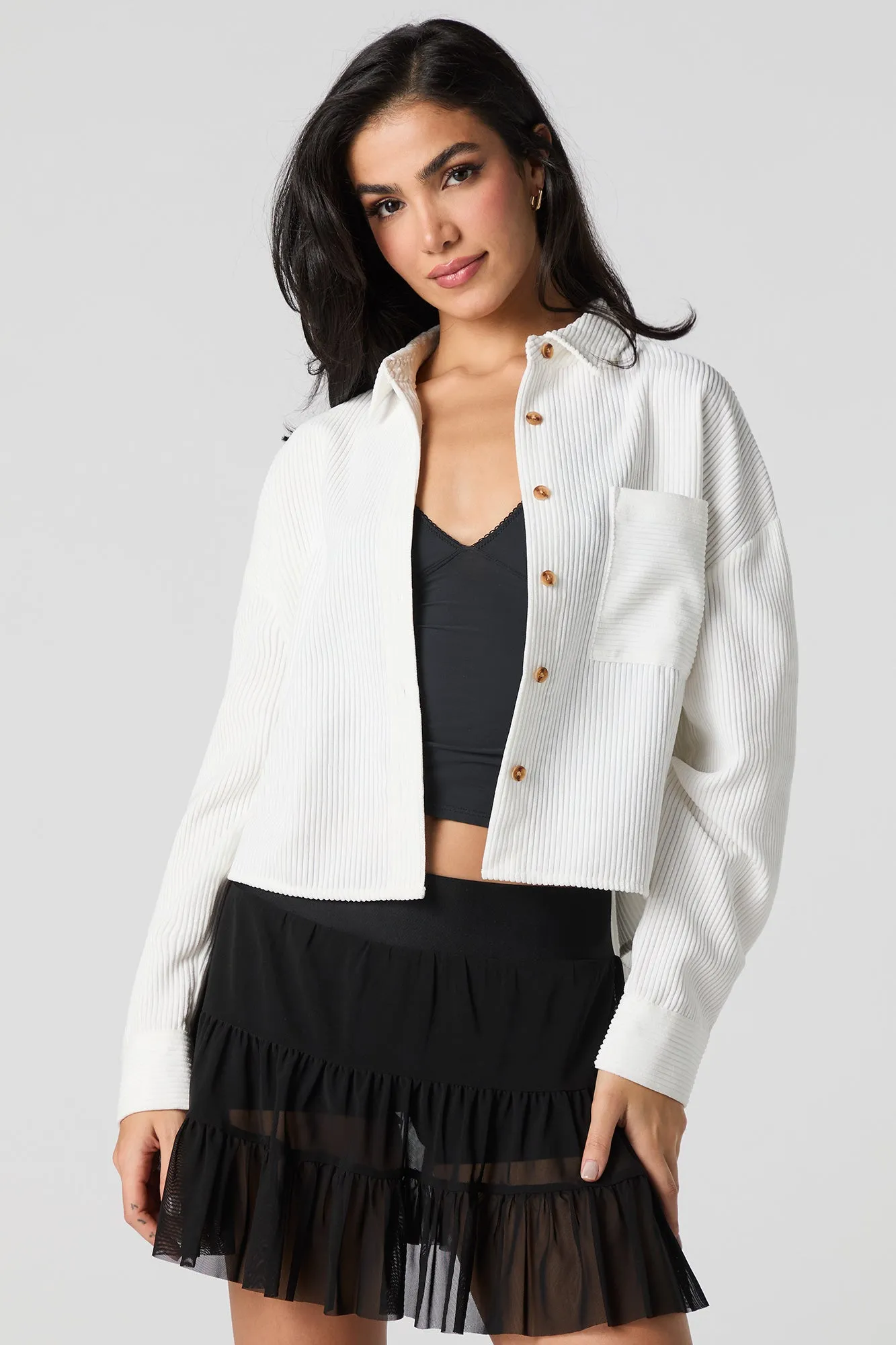 Haut écourté boutonné en velours côtelé à manche longue sold by Urban Planet