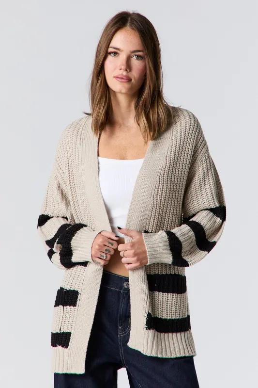 Cardigan surdimensionné en tricot rayé sold by Urban Planet