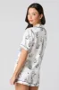 Satin Button-Up Top & Short 2 Piece Pajama Set sold by Urban Planet