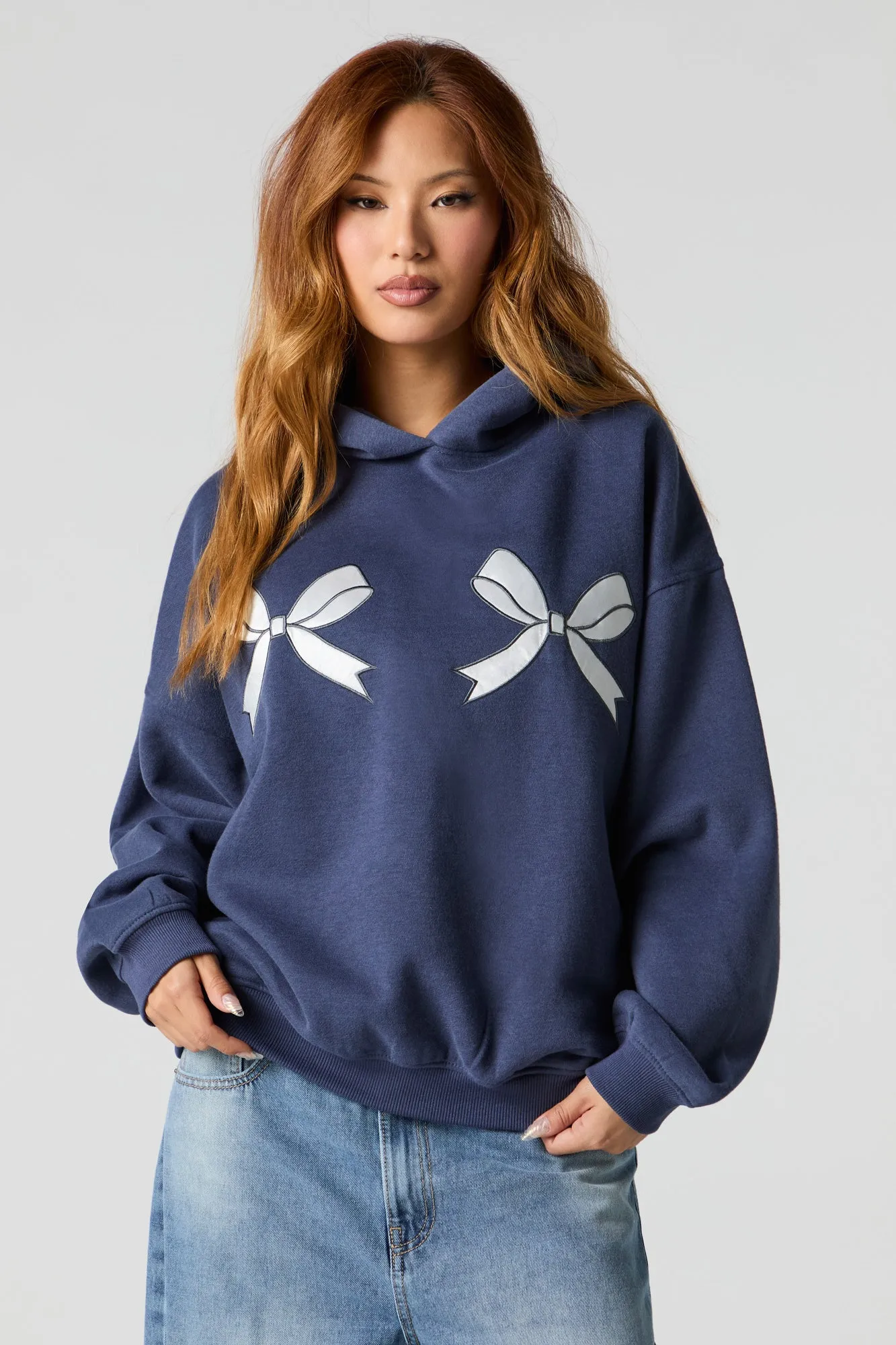 Bow Embroidered Oversized Fleece Hoodie sold by Urban Planet