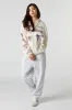Oversized Bow Graphic Zip-Up Hoodie sold by Urban Planet