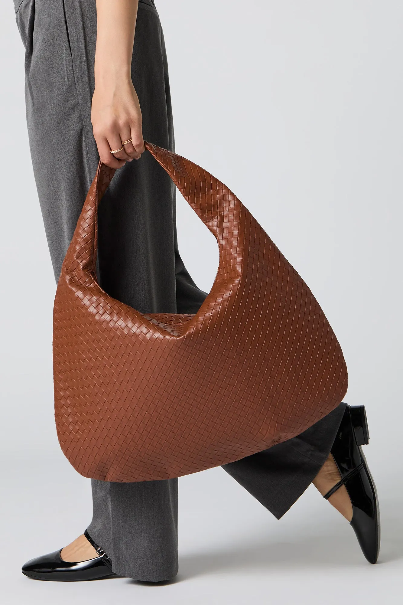 Faux Leather Woven Hobo Bag sold by Urban Planet