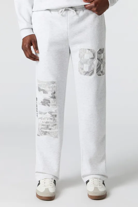 Camo Patch Fleece Sweatpant sold by Urban Planet