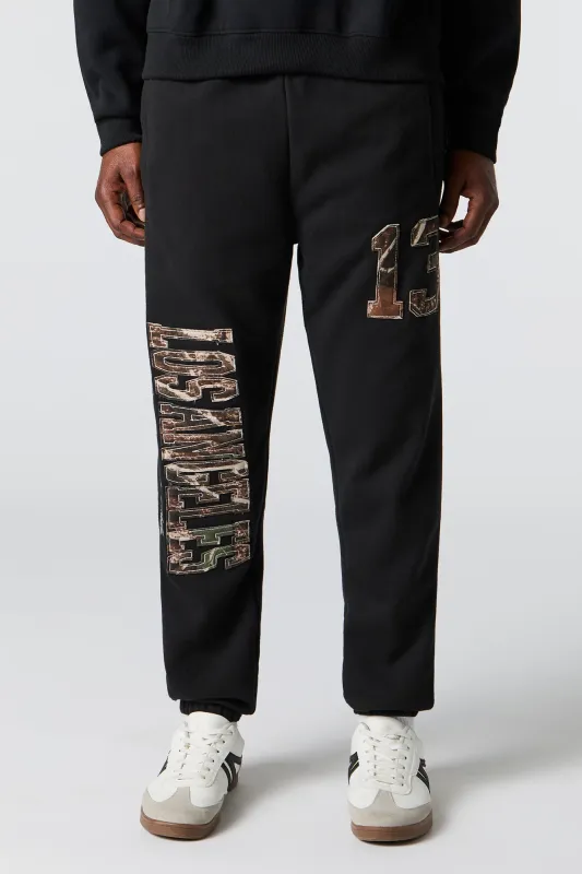 Camo Patch Fleece Jogger sold by Urban Planet