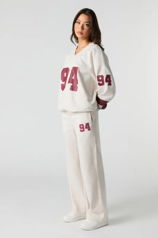 Pantalon d'entraînement en molleton à imprimé 94 sold by Urban Planet