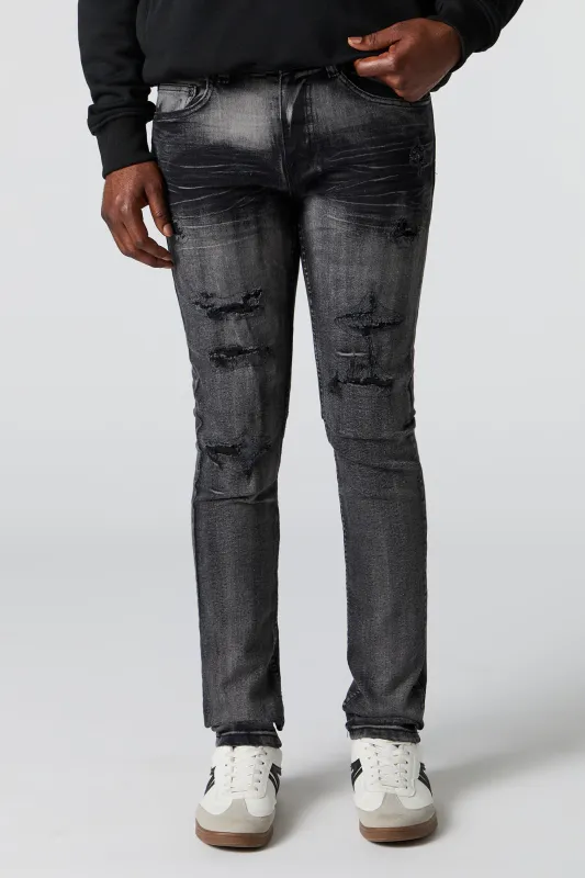 Jean ajusté déchiré noir sold by Urban Planet