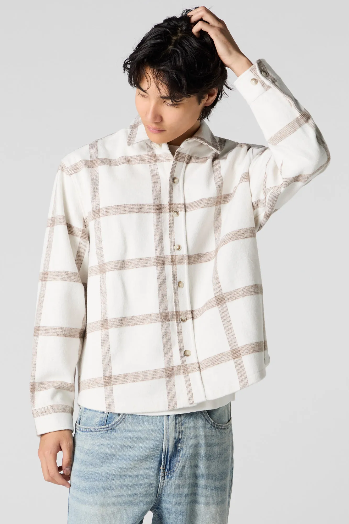 Plaid Shacket sold by Urban Planet