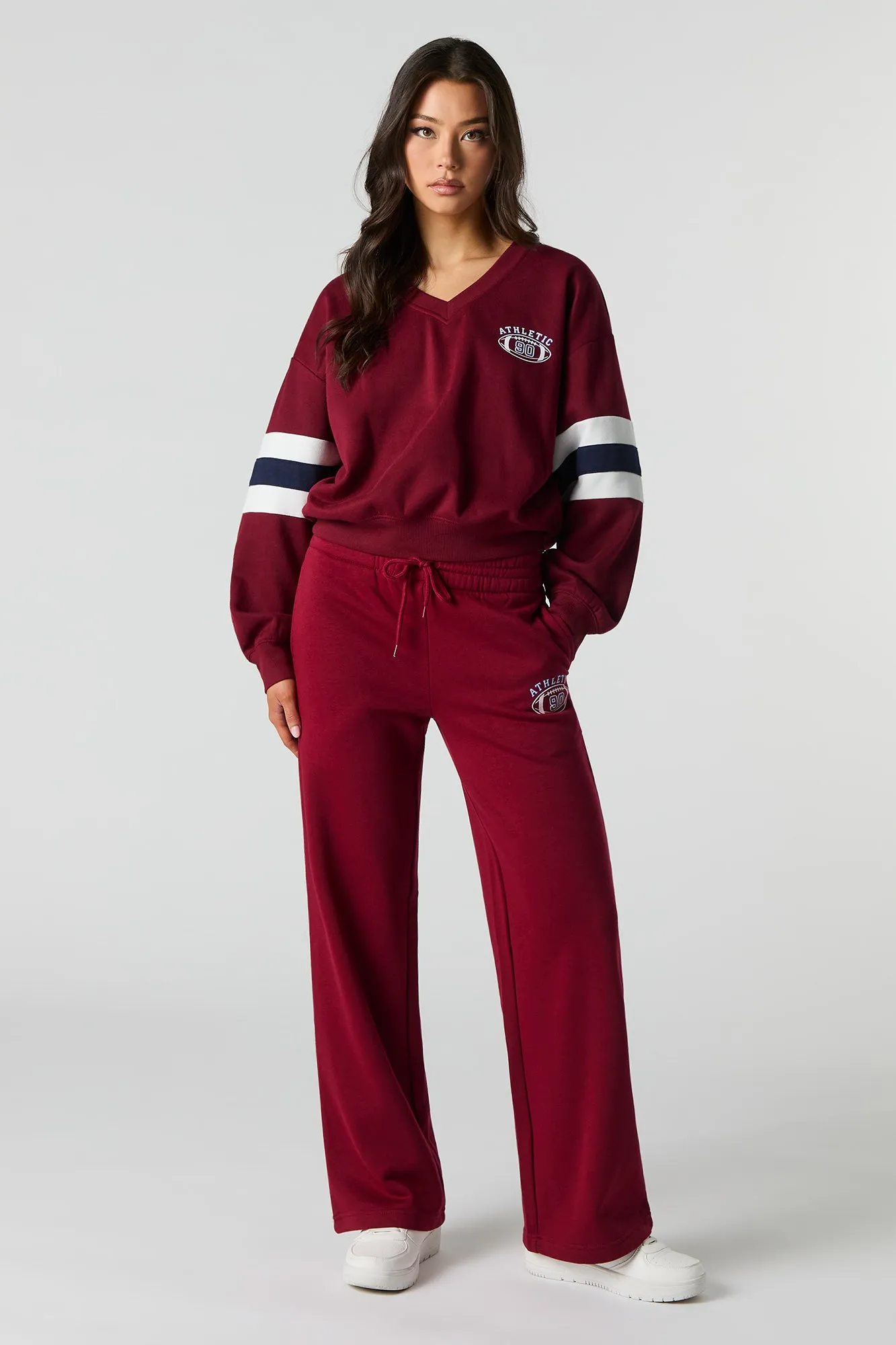 Athletic Graphic Fleece Sweatpant sold by Urban Planet
