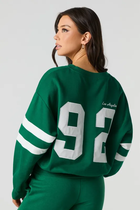 LA Embroidered Fleece Cropped Sweatshirt sold by Urban Planet