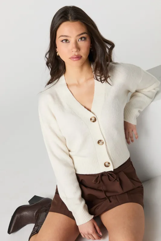 Cartigan boutonné en tricot mousseux sold by Urban Planet