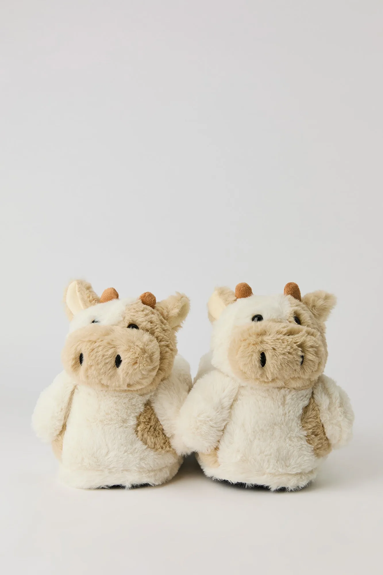 Faux Fur 3D Cow Slipper sold by Urban Planet