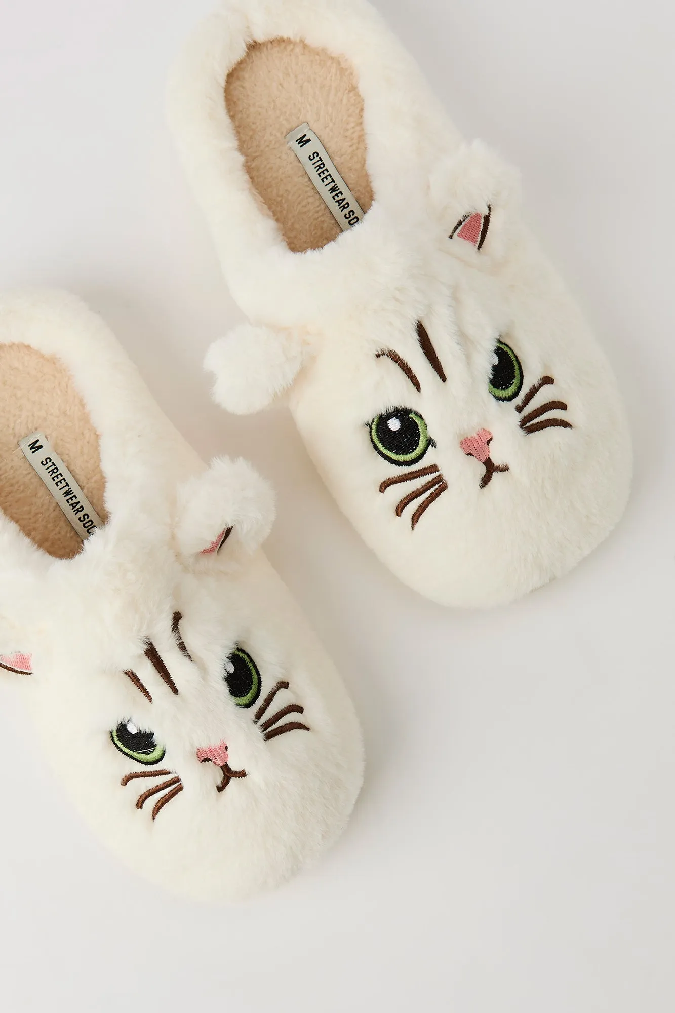 Plush Cat Slippers sold by Urban Planet