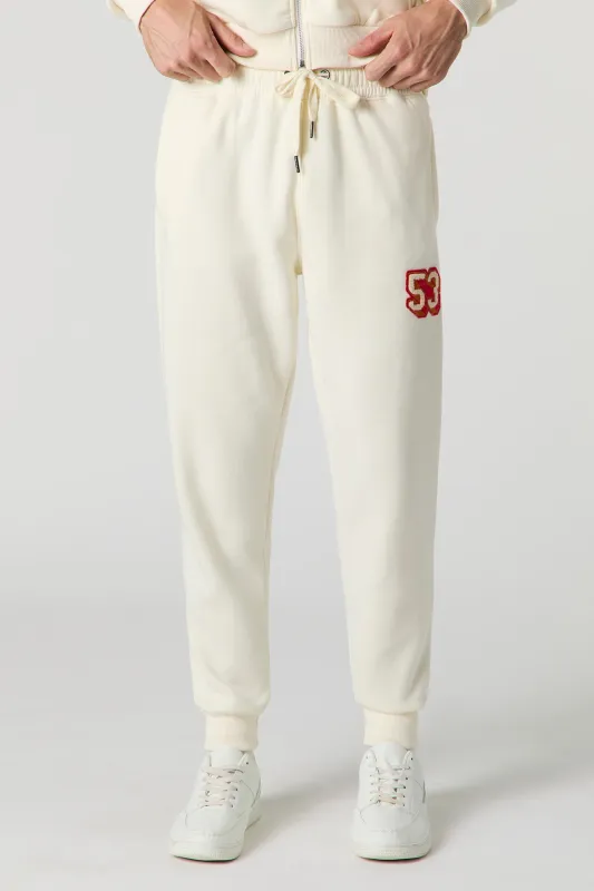 53 Chenille Embroidered Jogger sold by Urban Planet