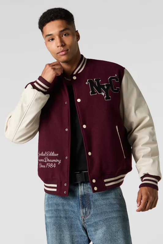 Faux Leather Sleeve Fleece Varsity Jacket sold by Urban Planet