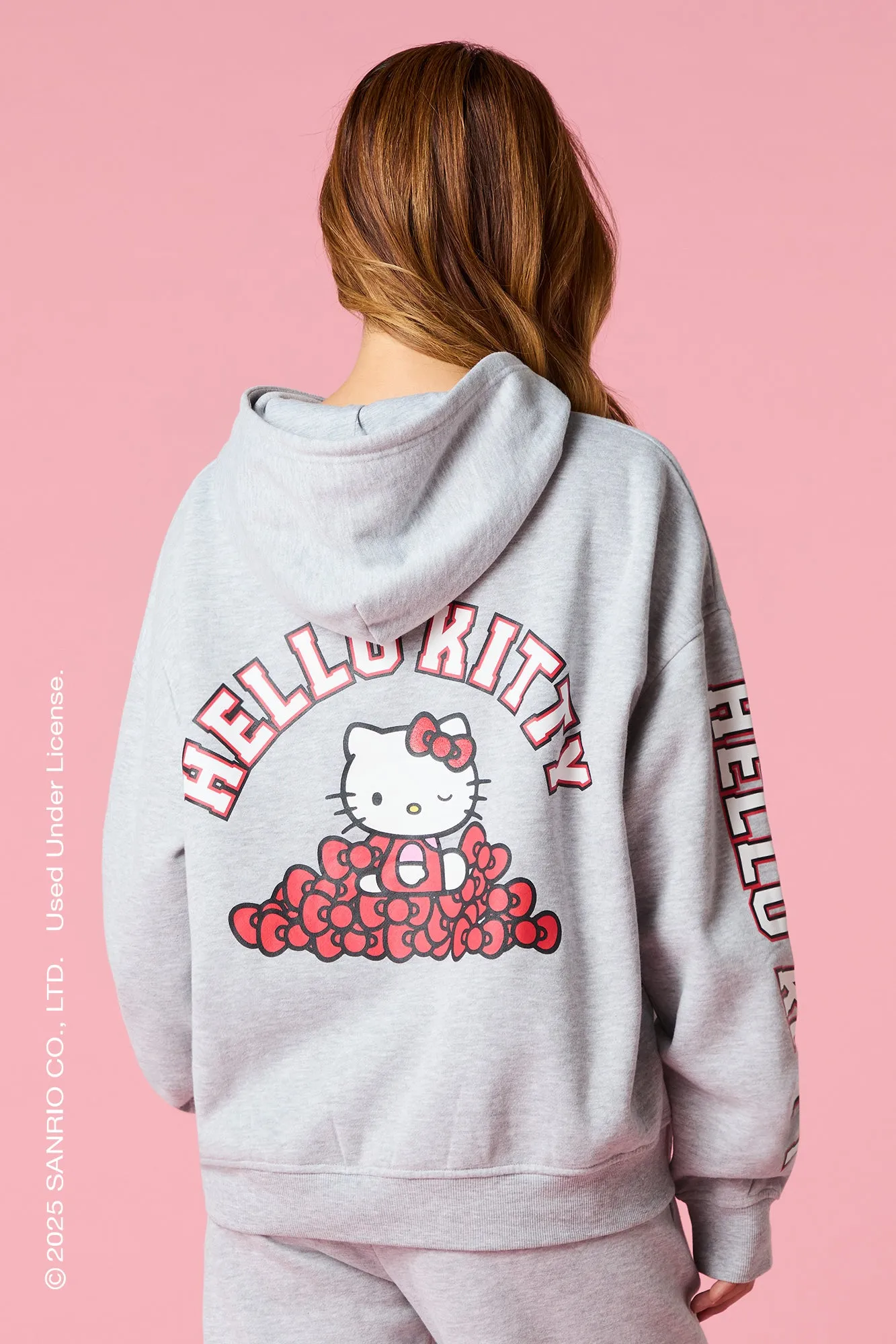 Hello Kitty® Bow Graphic Fleece Hoodie sold by Urban Planet