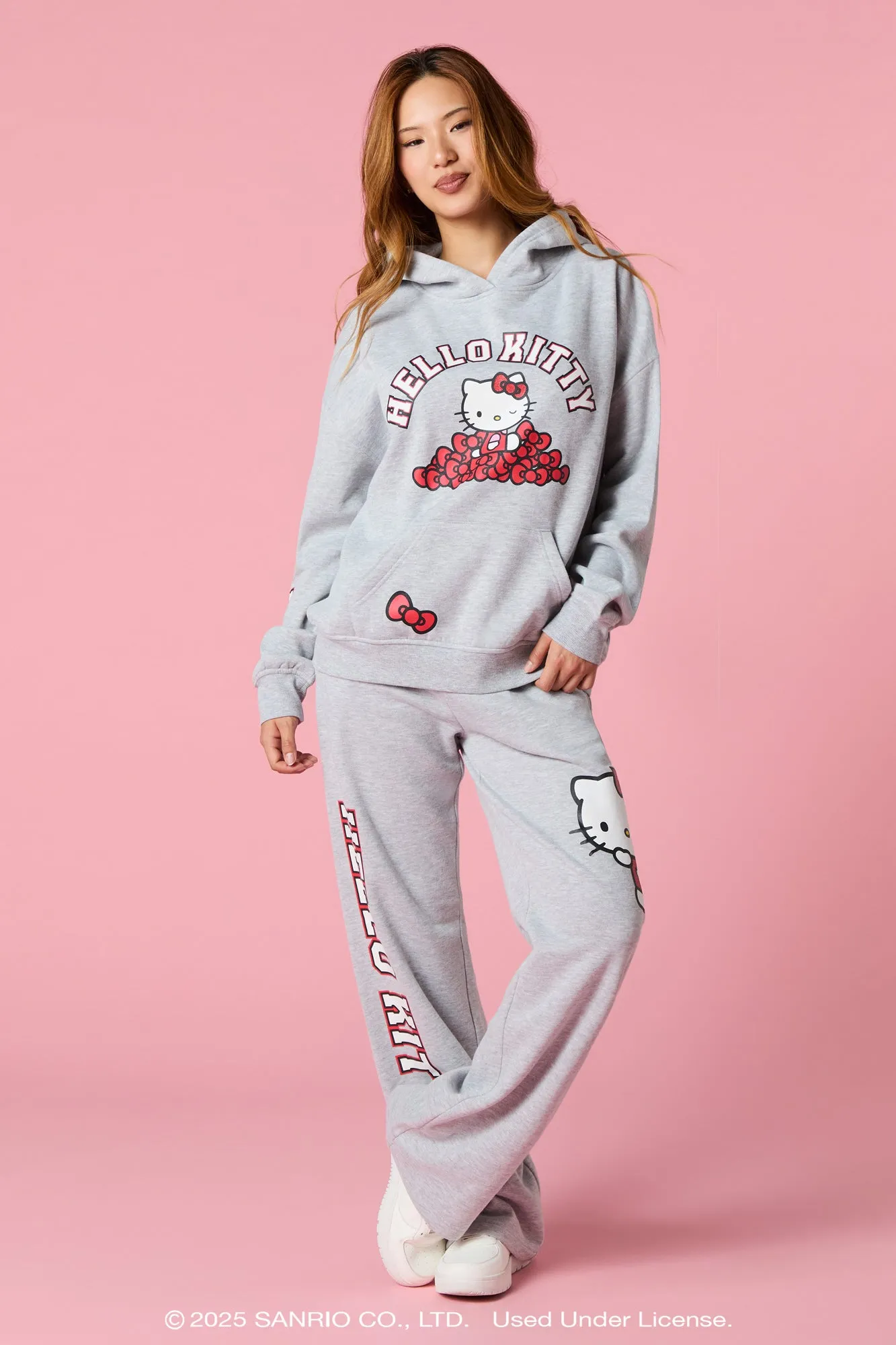 Hello Kitty® Bow Graphic Wide Leg Fleece Sweatpant sold by Urban Planet