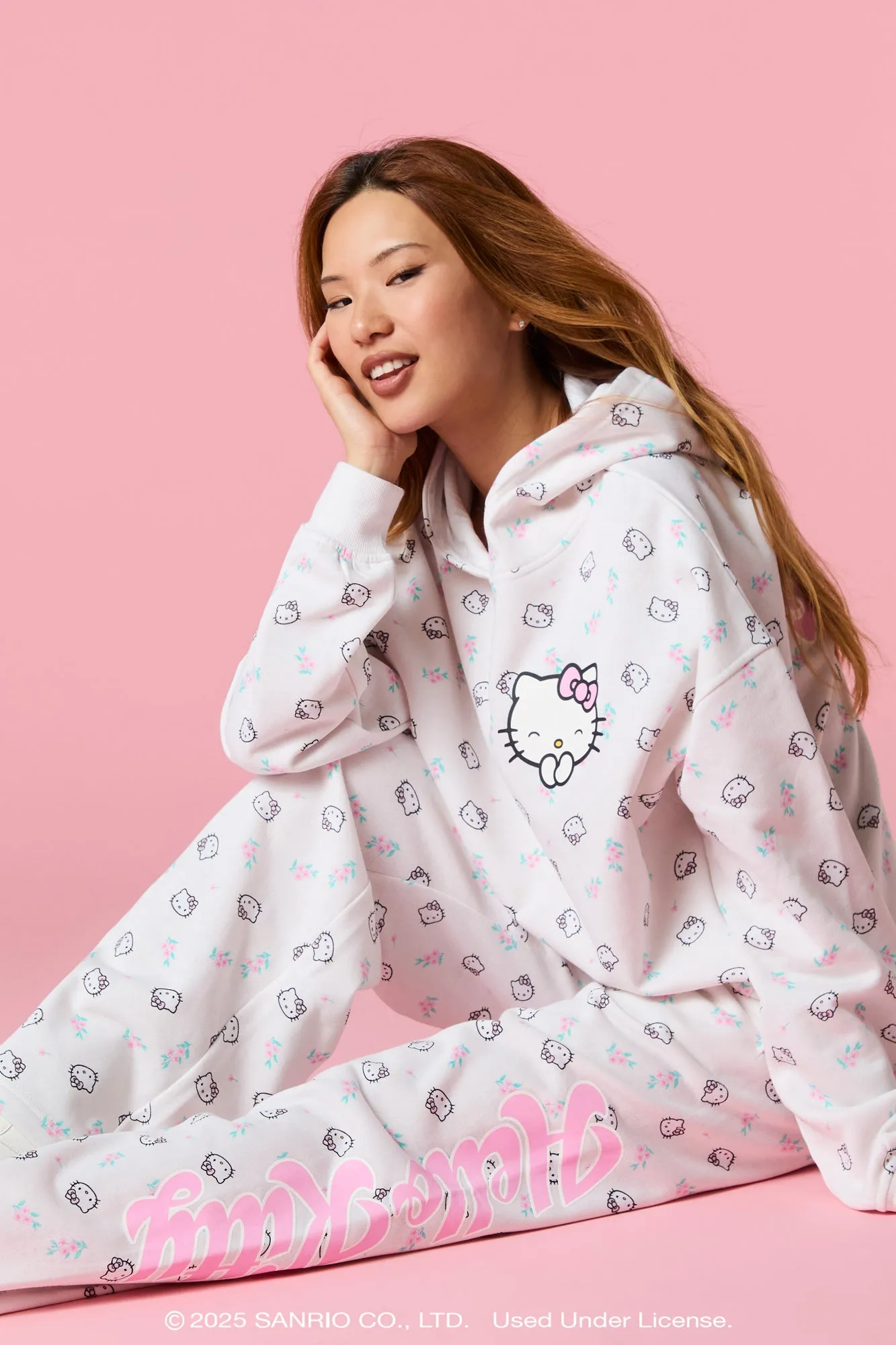 Hello Kitty® Print Wide Leg Fleece Sweatpant sold by Urban Planet