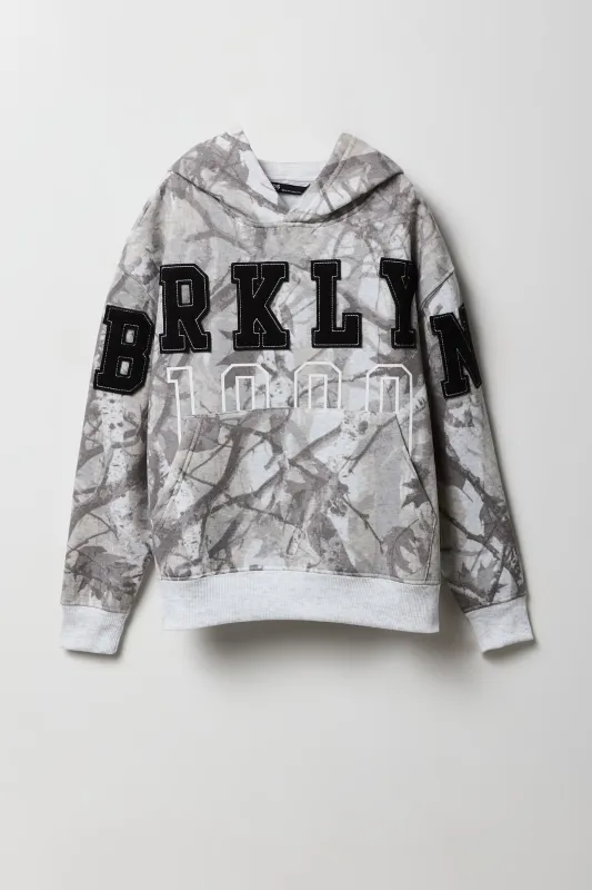 Haut à capuchon en molleton avec empiècement à motif camouflage pour enfant sold by Urban Planet