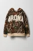 Haut à capuchon en molleton avec empiècement à motif camouflage pour enfant sold by Urban Planet