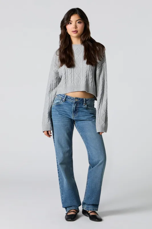 Jean rigide à taille basse et jambe droite lavé moyen sold by Urban Planet