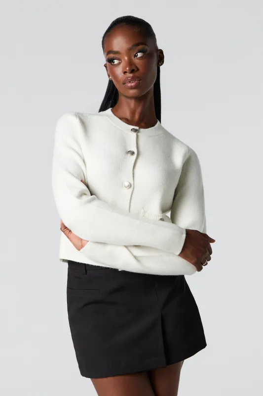 Cardigan boutonné en tricot sold by Urban Planet