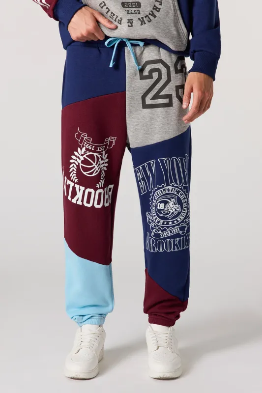 Jogger en molleton avec blocs de couleurs et imprimé New York sold by Urban Planet