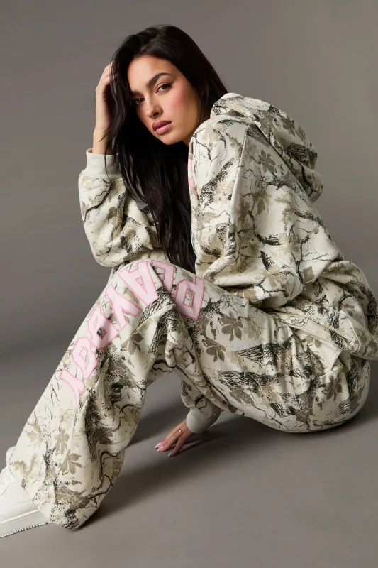 Playboy HD Print Fleece Wide Leg Sweatpant sold by Urban Planet