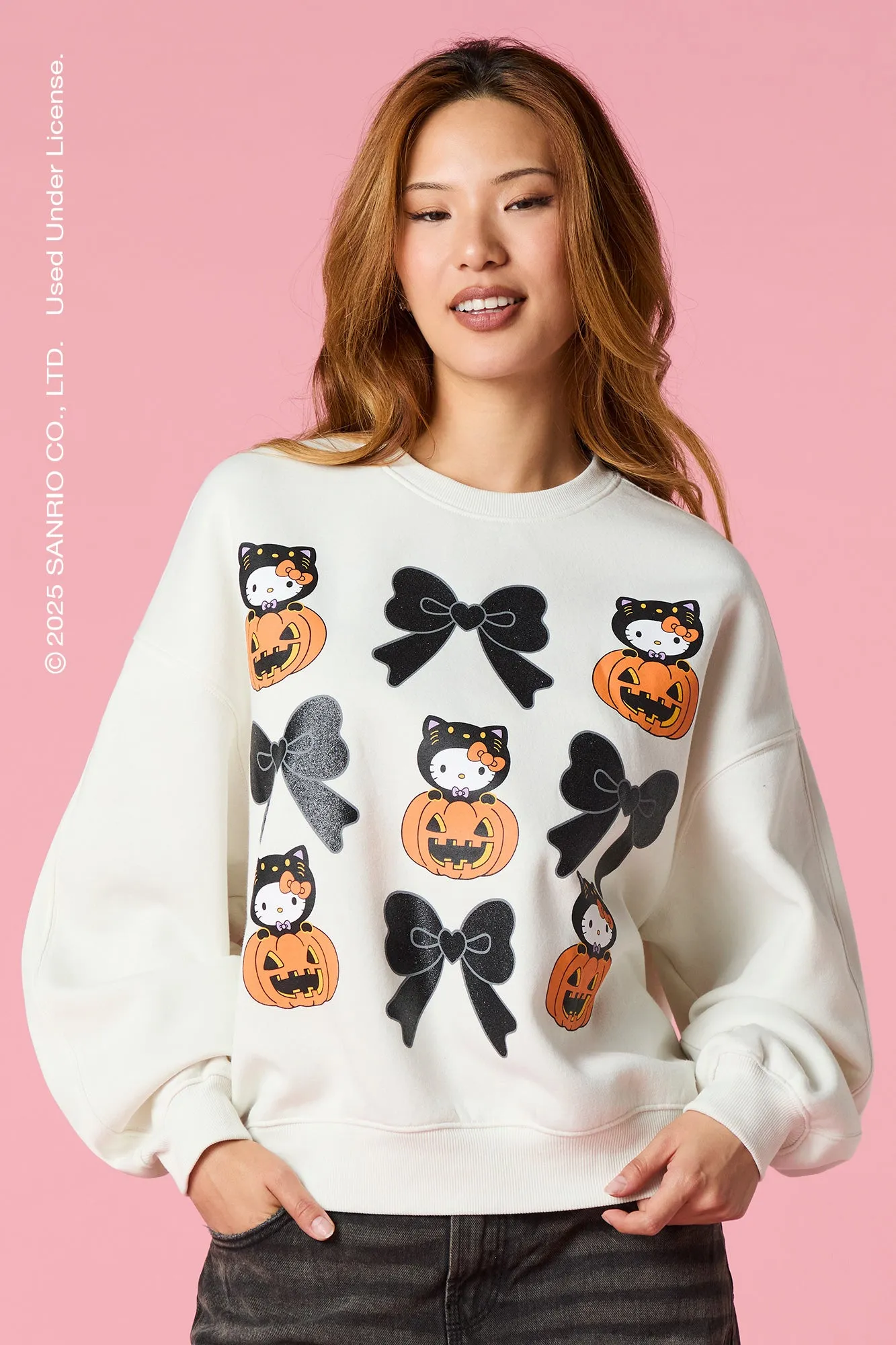 Hello Kitty® Graphic Halloween Fleece Sweatshirt sold by Urban Planet