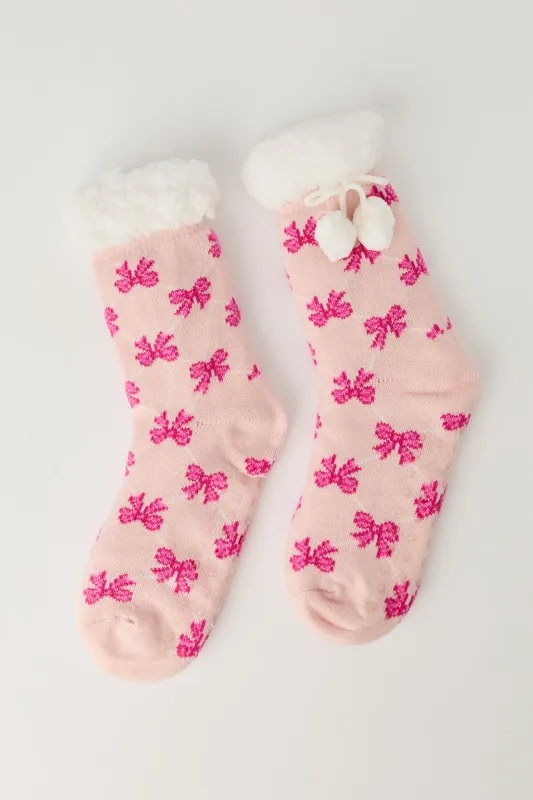 Pantoufles-chaussettes sold by Urban Planet