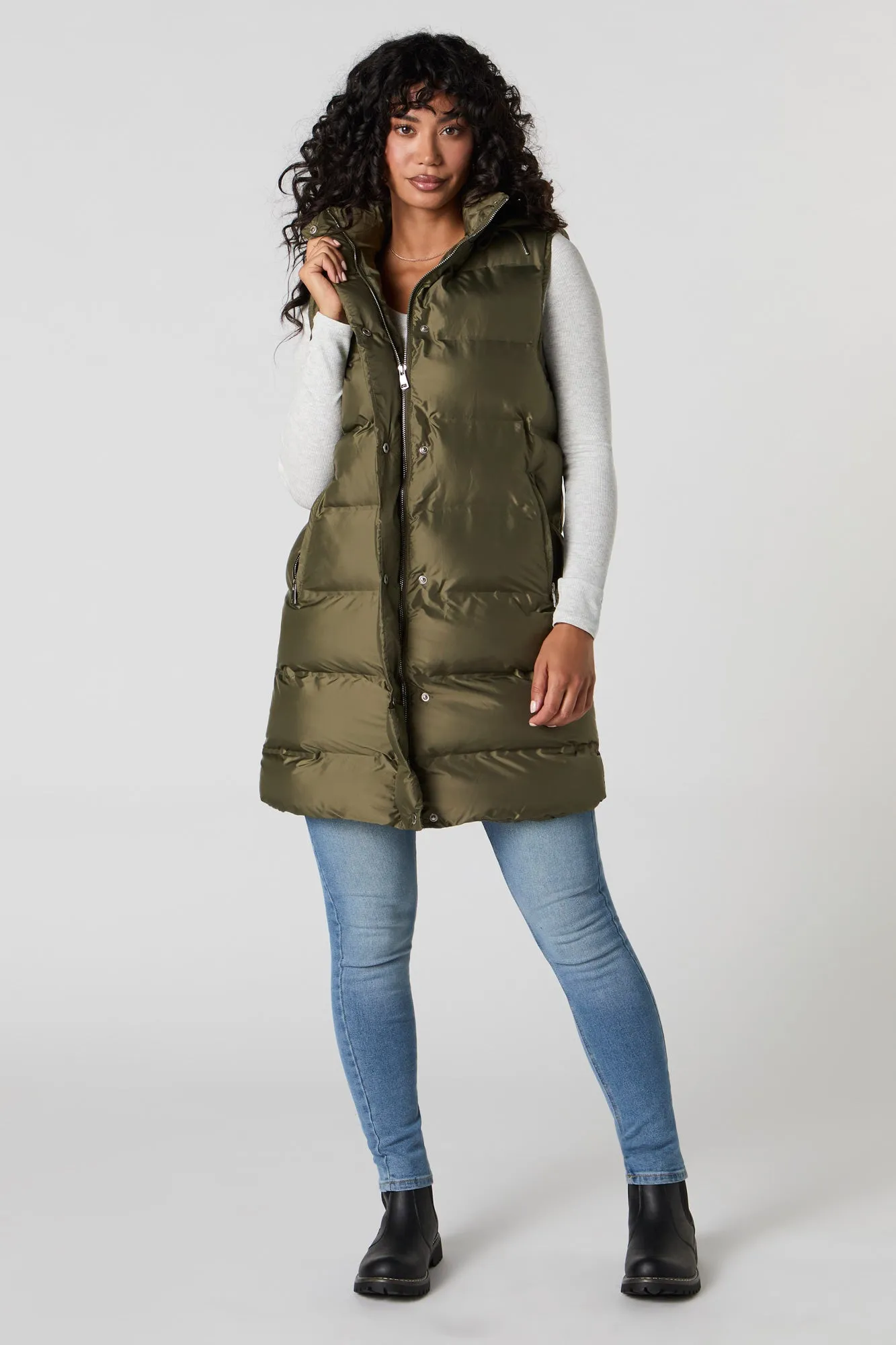 Hooded Longline Puffer Vest sold by Urban Planet