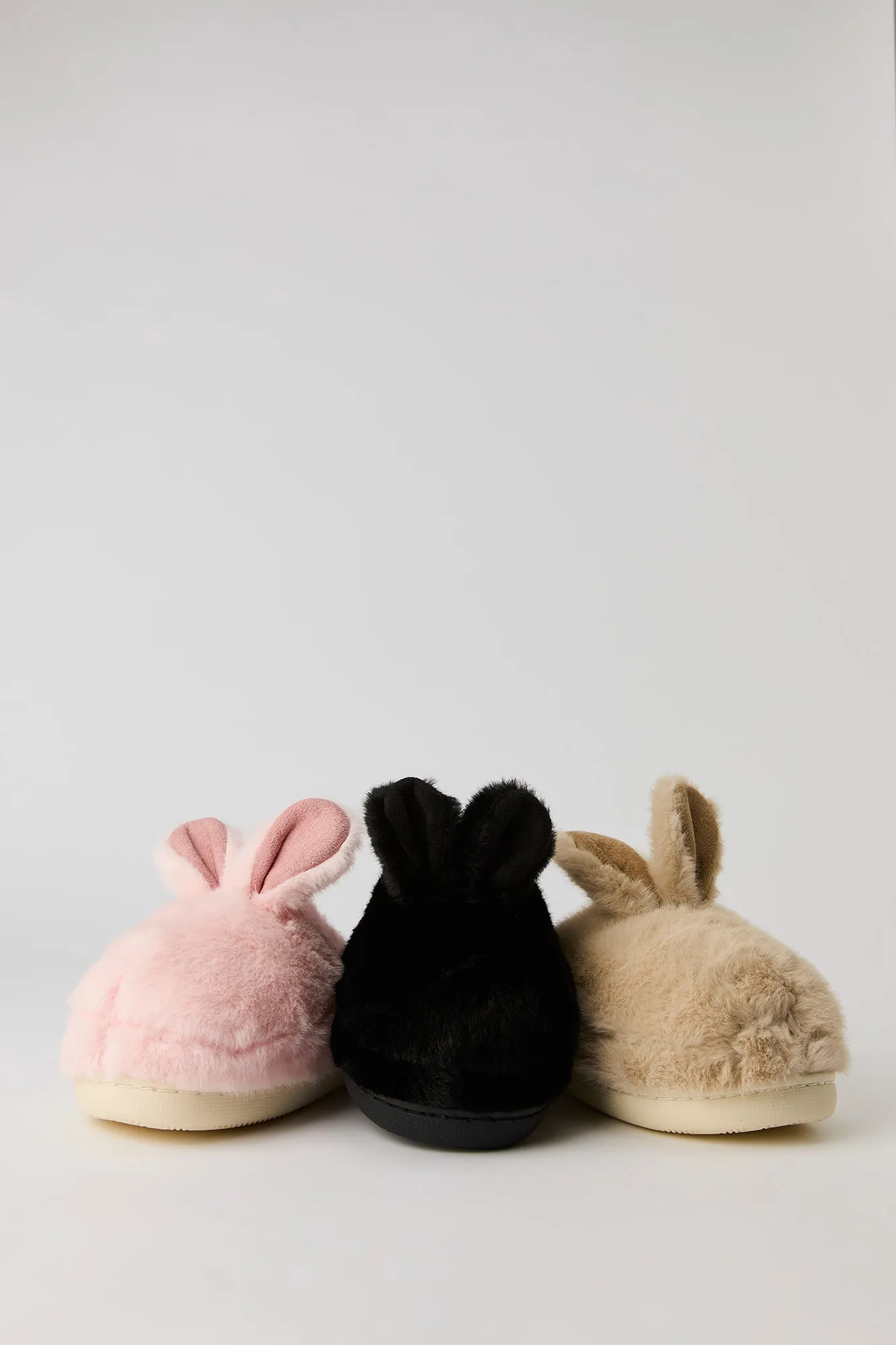 Plush Bunny Slippers sold by Urban Planet